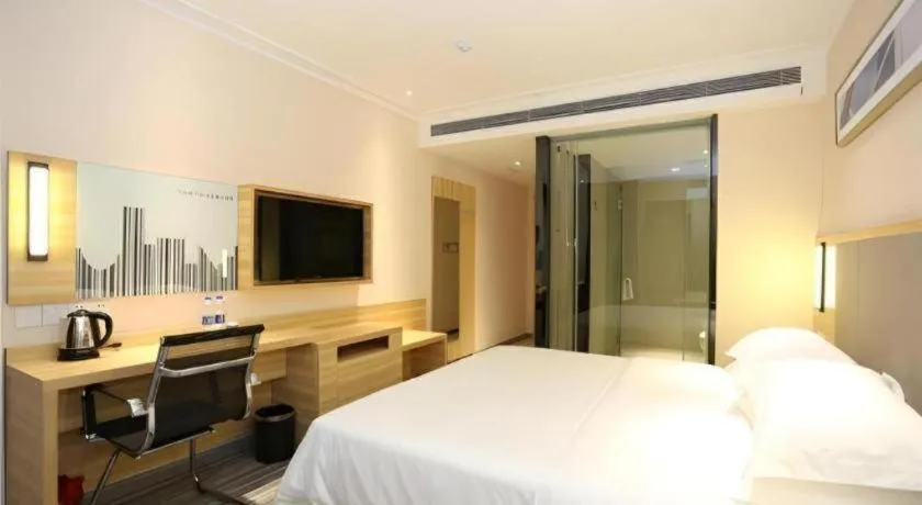 Bed in City Comfort Inn Changsha Jingwanzi Desiqin Plaza