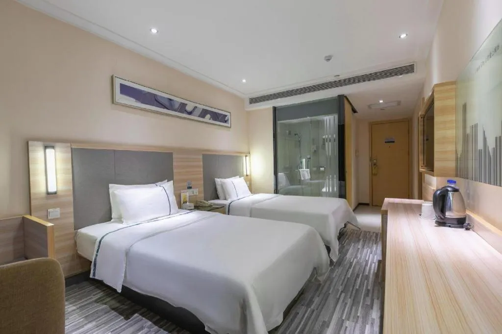 Bed in City Comfort Inn Changsha Jingwanzi Desiqin Plaza