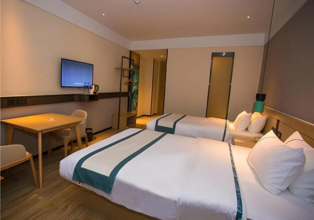 Bed in City Comfort Inn Wuhan Daxueyuan Road Qingfeng Villa