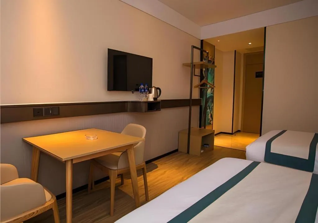 Bed in City Comfort Inn Wuhan Daxueyuan Road Qingfeng Villa