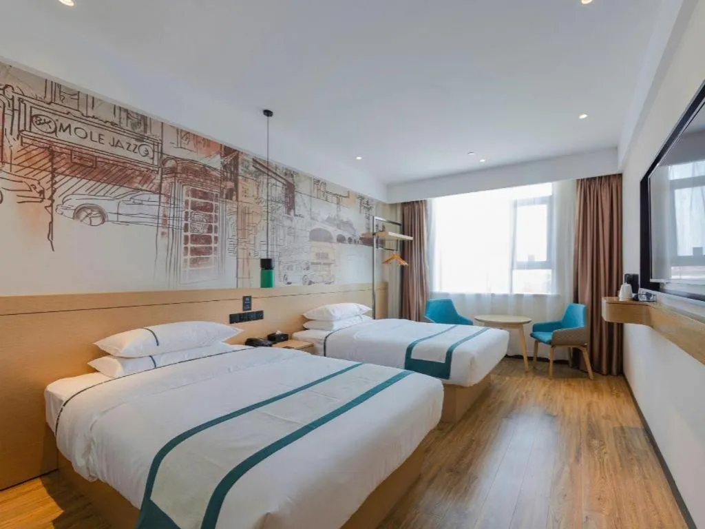 Bed in City Comfort Inn Wuhan Daxueyuan Road Qingfeng Villa