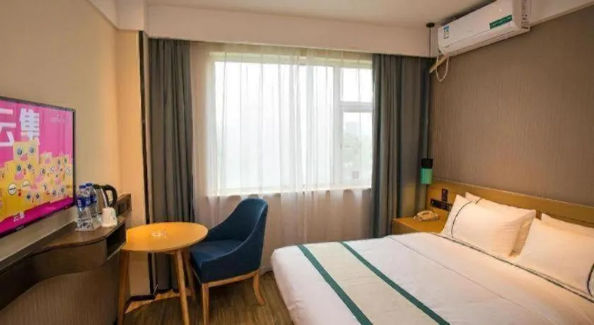 Bed in City Comfort Inn Wuhan Daxueyuan Road Qingfeng Villa