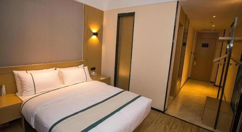 Bed in City Comfort Inn Wuhan Daxueyuan Road Qingfeng Villa