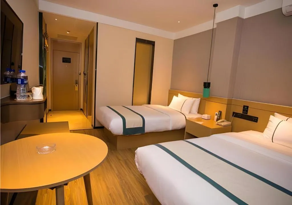 Bed in City Comfort Inn Wuhan Daxueyuan Road Qingfeng Villa