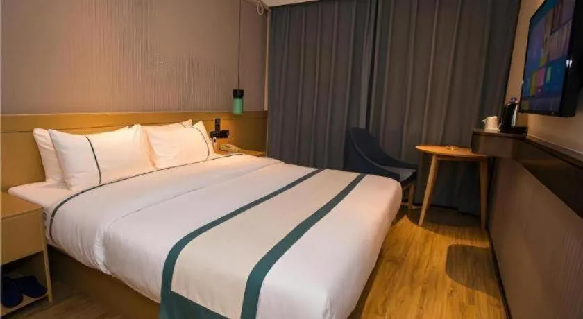 Bed in City Comfort Inn Wuhan Daxueyuan Road Qingfeng Villa