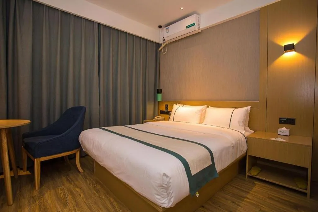 Bed in City Comfort Inn Wuhan Daxueyuan Road Qingfeng Villa
