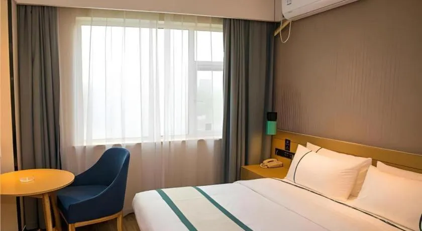 Bed in City Comfort Inn Wuhan Daxueyuan Road Qingfeng Villa