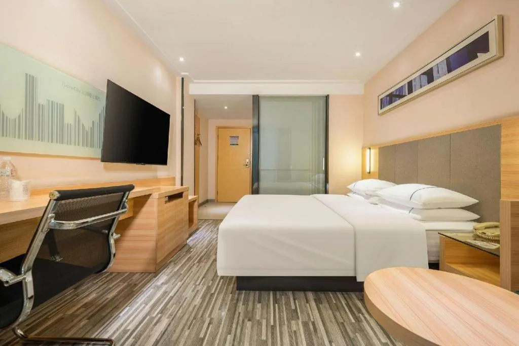 Bed in City Comfort Inn Hechi Chengxi Avenue