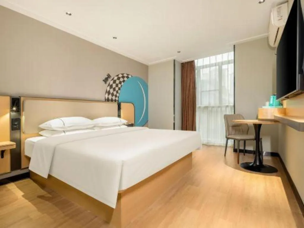 Bed in City Comfort Inn Hechi Chengxi Avenue