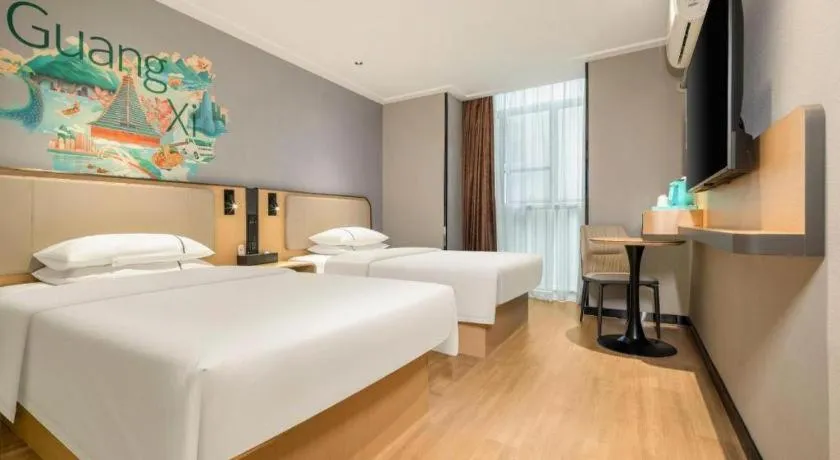 Bed in City Comfort Inn Hechi Chengxi Avenue