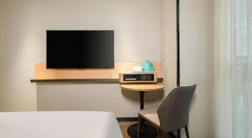 Bed in City Comfort Inn Hechi Chengxi Avenue