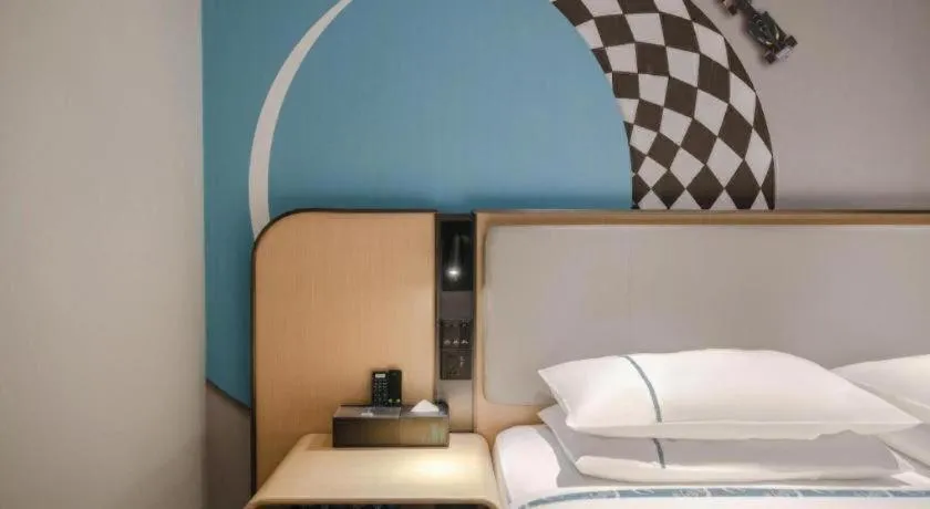 Bed in City Comfort Inn Hechi Chengxi Avenue