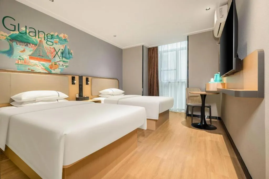 Bed in City Comfort Inn Hechi Chengxi Avenue