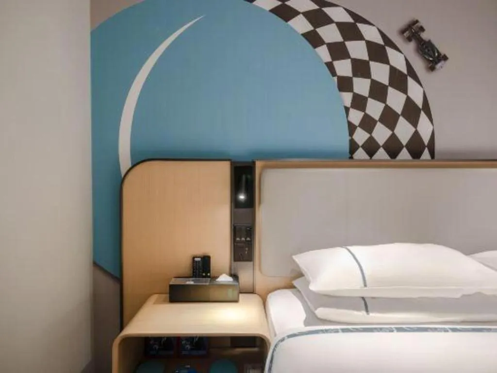 Bed in City Comfort Inn Hechi Chengxi Avenue