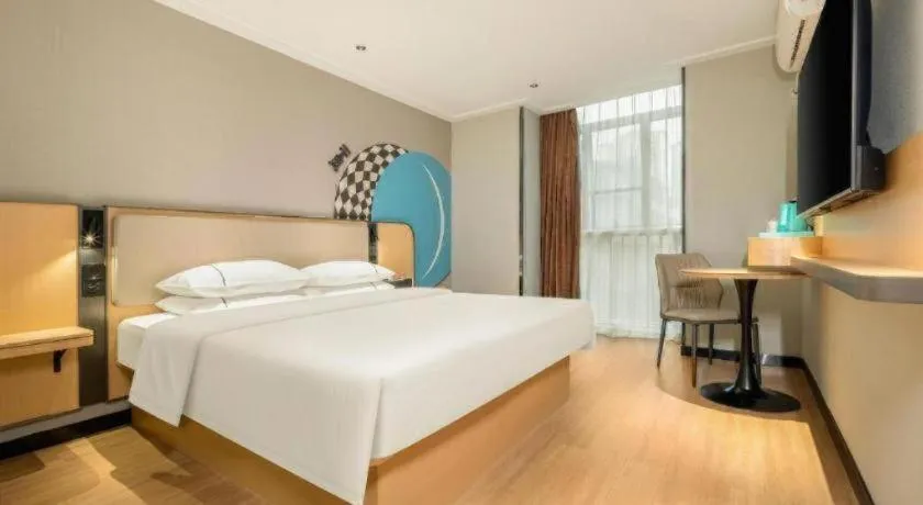 Bed in City Comfort Inn Hechi Chengxi Avenue