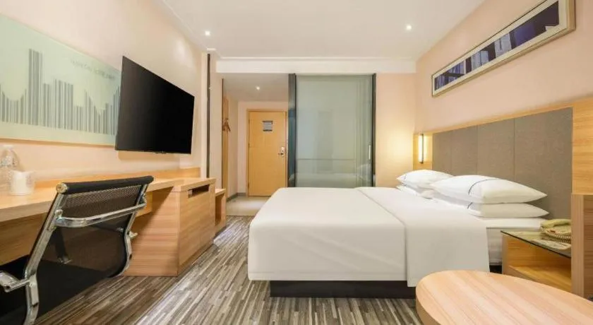 Bed in City Comfort Inn Hechi Chengxi Avenue