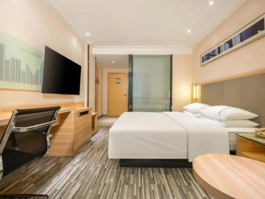 Bed in City Comfort Inn Hechi Chengxi Avenue