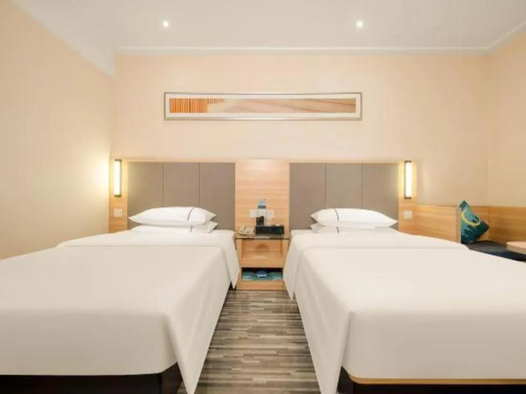 Bed in City Comfort Inn Hechi Chengxi Avenue