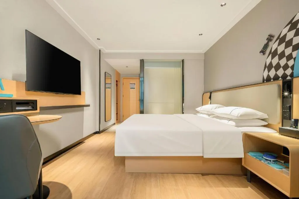 Bed in City Comfort Inn Hechi Chengxi Avenue