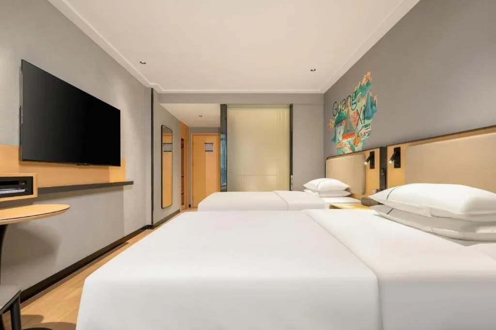 Bed in City Comfort Inn Hechi Chengxi Avenue