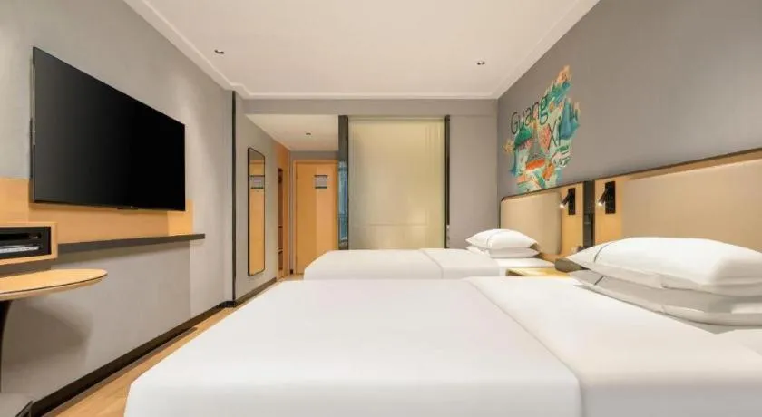 Bed in City Comfort Inn Hechi Chengxi Avenue