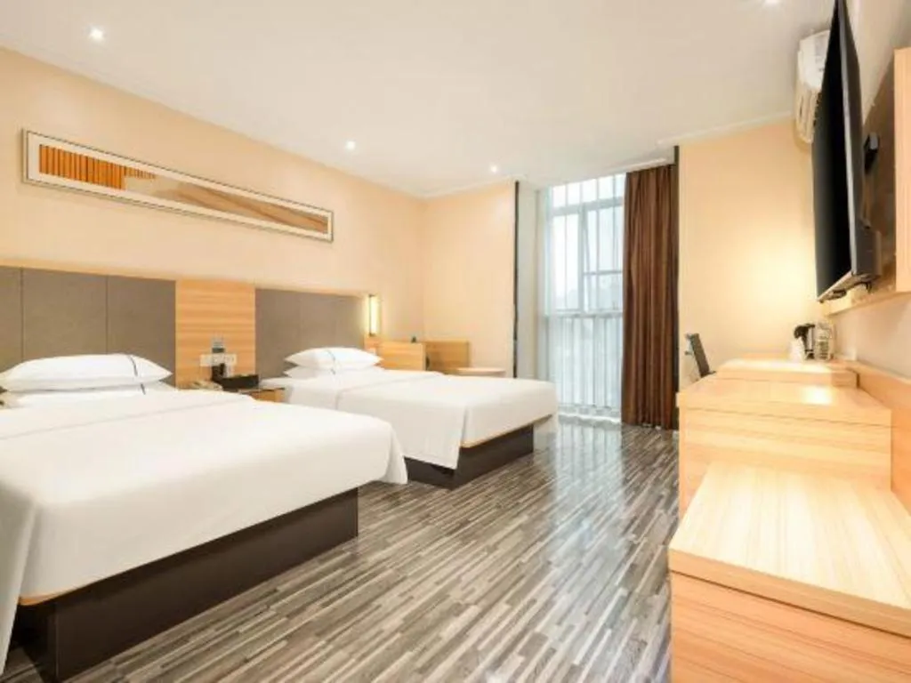 Bed in City Comfort Inn Hechi Chengxi Avenue