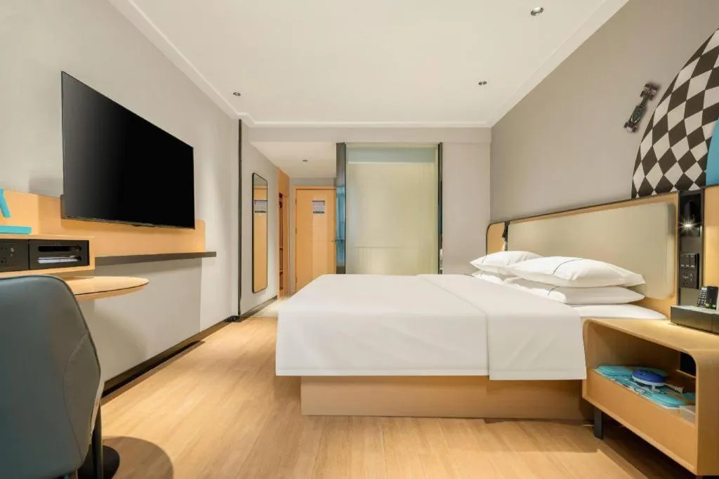 Bed in City Comfort Inn Hechi Chengxi Avenue