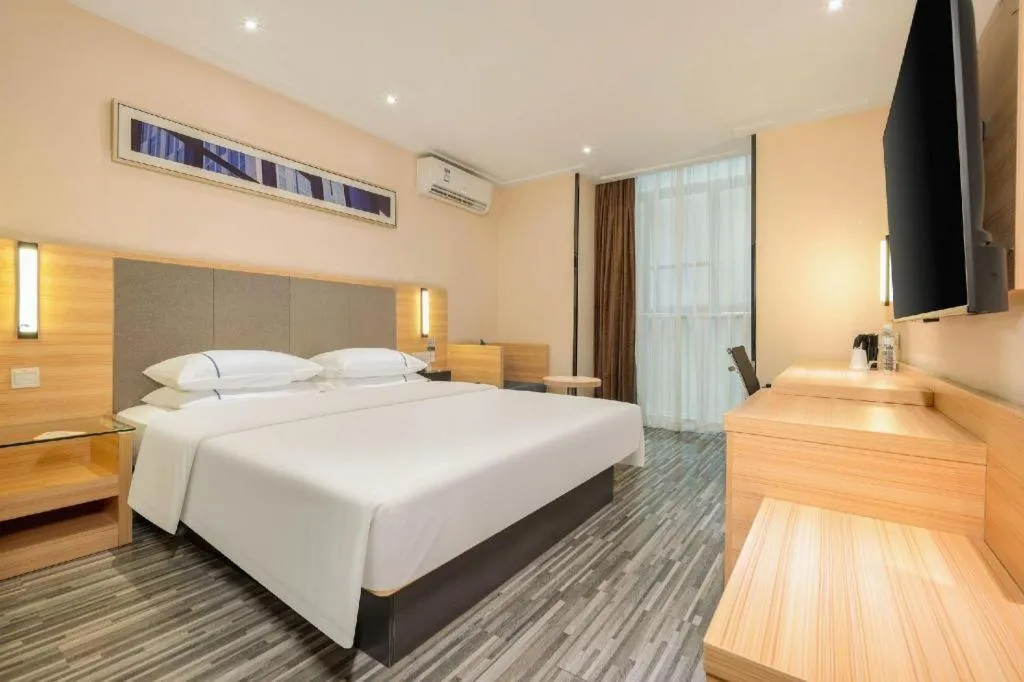 Bed in City Comfort Inn Hechi Chengxi Avenue