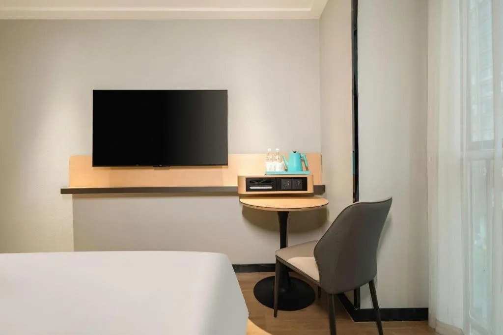 Bed in City Comfort Inn Hechi Chengxi Avenue