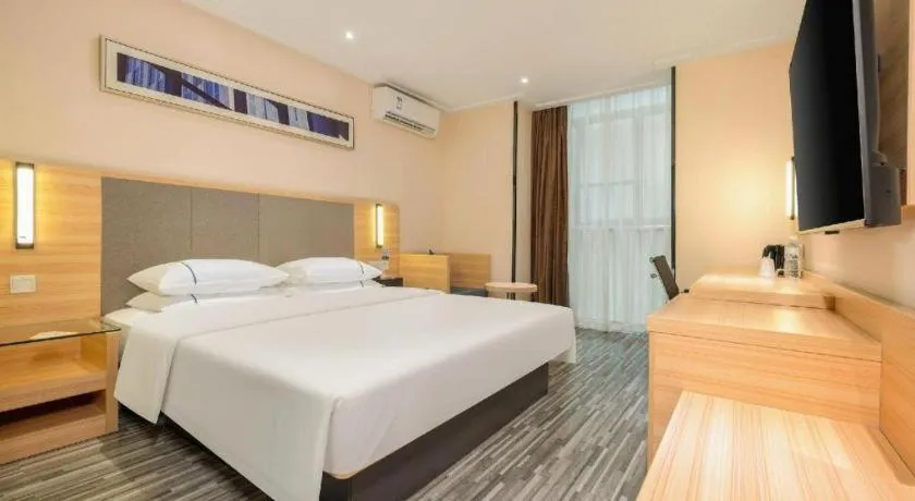 Bed in City Comfort Inn Hechi Chengxi Avenue