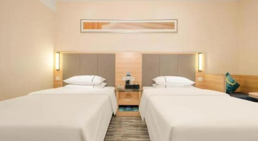 Bed in City Comfort Inn Hechi Chengxi Avenue