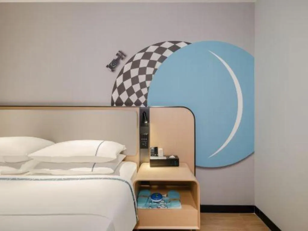 Bed in City Comfort Inn Hechi Chengxi Avenue