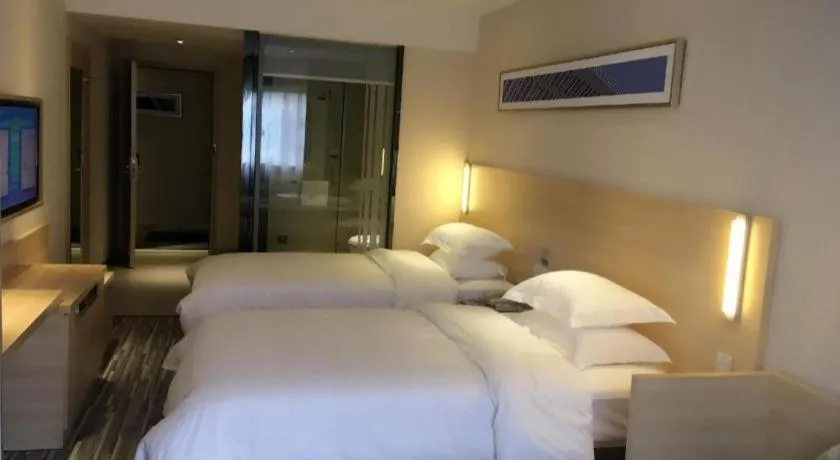 Bed in City Comfort Inn Zhongshan Xiaolan Xinduhui Gymnasium