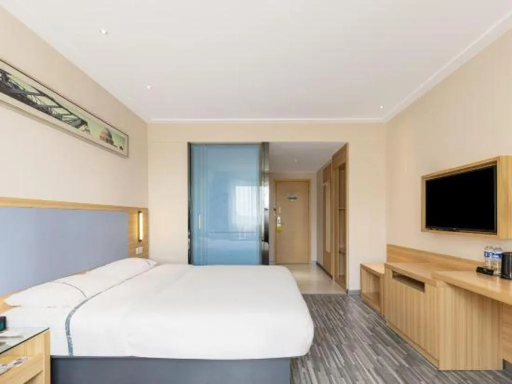 Bed in City Comfort Inn Zhongshan Xiaolan Xinduhui Gymnasium