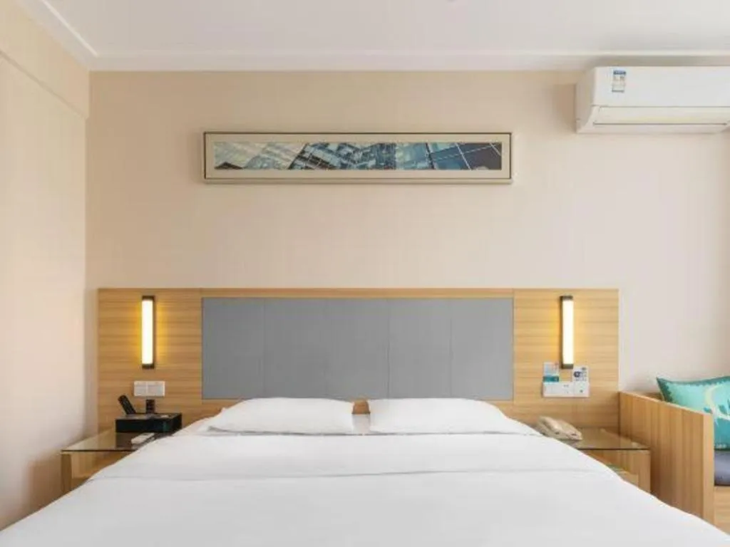 Bed in City Comfort Inn Zhongshan Xiaolan Xinduhui Gymnasium