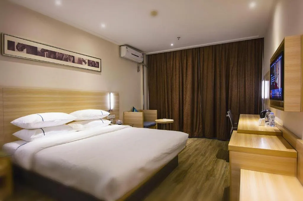 Bed in City Comfort Inn Zhongshan Xiaolan Xinduhui Gymnasium