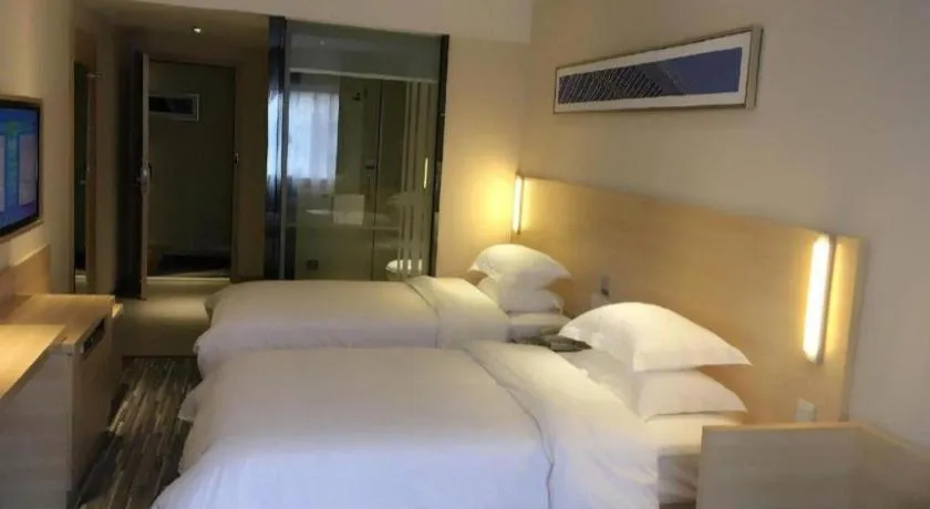 Bed in City Comfort Inn Zhongshan Xiaolan Xinduhui Gymnasium