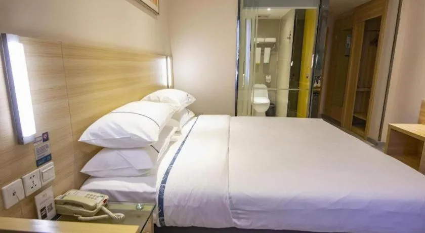 Bed in City Comfort Inn Zhongshan Xiaolan Xinduhui Gymnasium