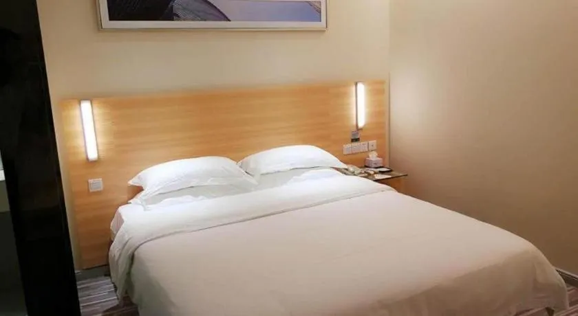 Bed in City Comfort Inn Zhongshan Xiaolan Xinduhui Gymnasium