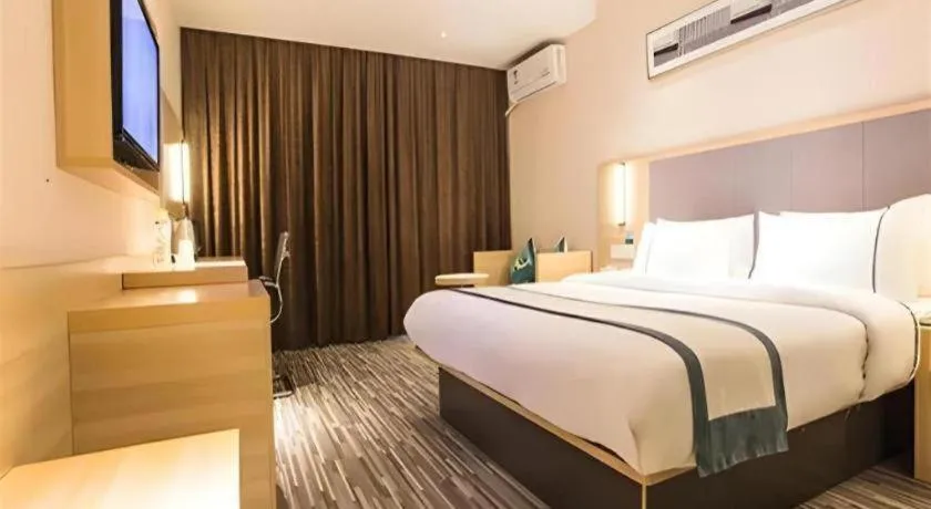 Bed in City Comfort Inn Zhongshan Xiaolan Xinduhui Gymnasium
