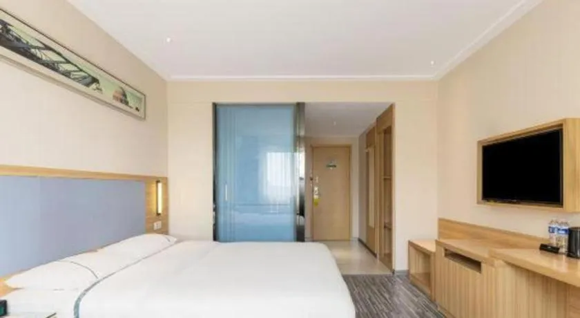 Bed in City Comfort Inn Zhongshan Xiaolan Xinduhui Gymnasium