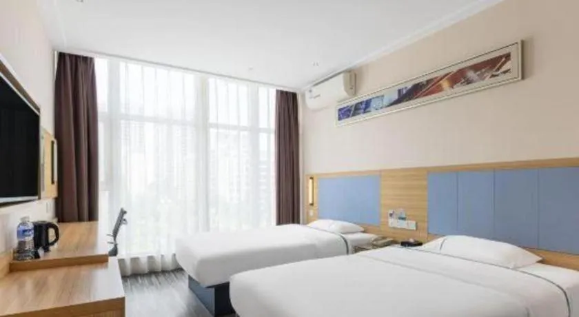 Bed in City Comfort Inn Zhongshan Xiaolan Xinduhui Gymnasium