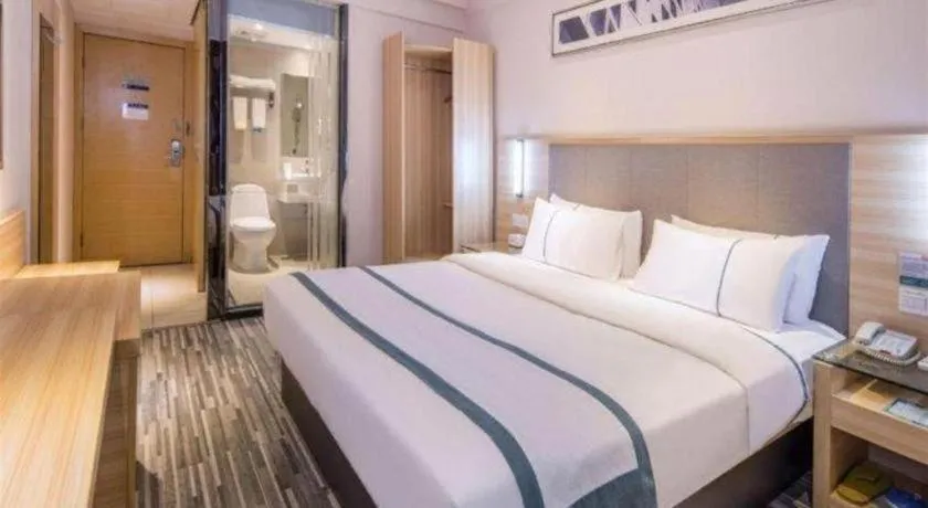 Bed in City Comfort Inn Zhongshan Xiaolan Xinduhui Gymnasium