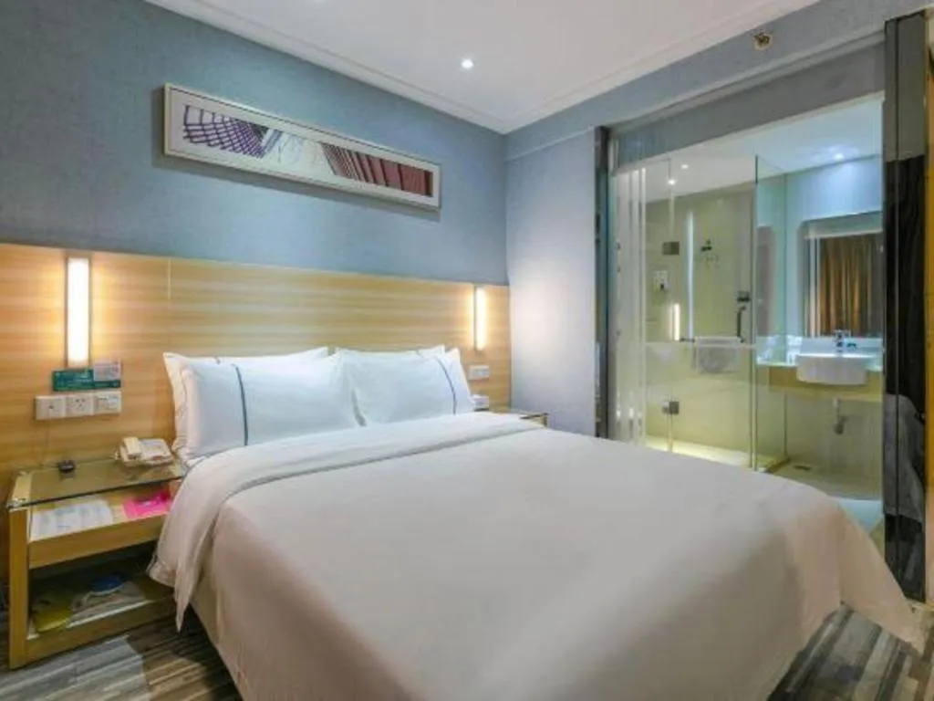 Bed in City Comfort Inn Zhongshan Xiaolan Xinduhui Gymnasium