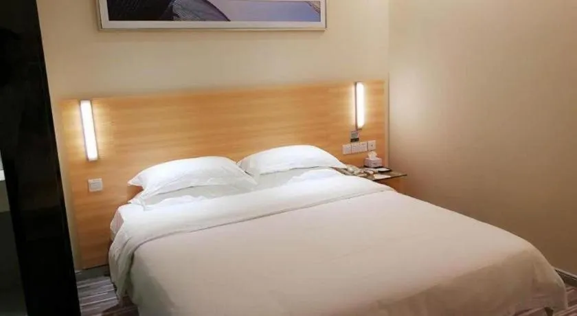 Bed in City Comfort Inn Zhongshan Xiaolan Xinduhui Gymnasium