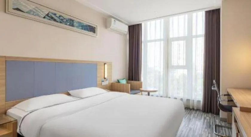 Bed in City Comfort Inn Zhongshan Xiaolan Xinduhui Gymnasium