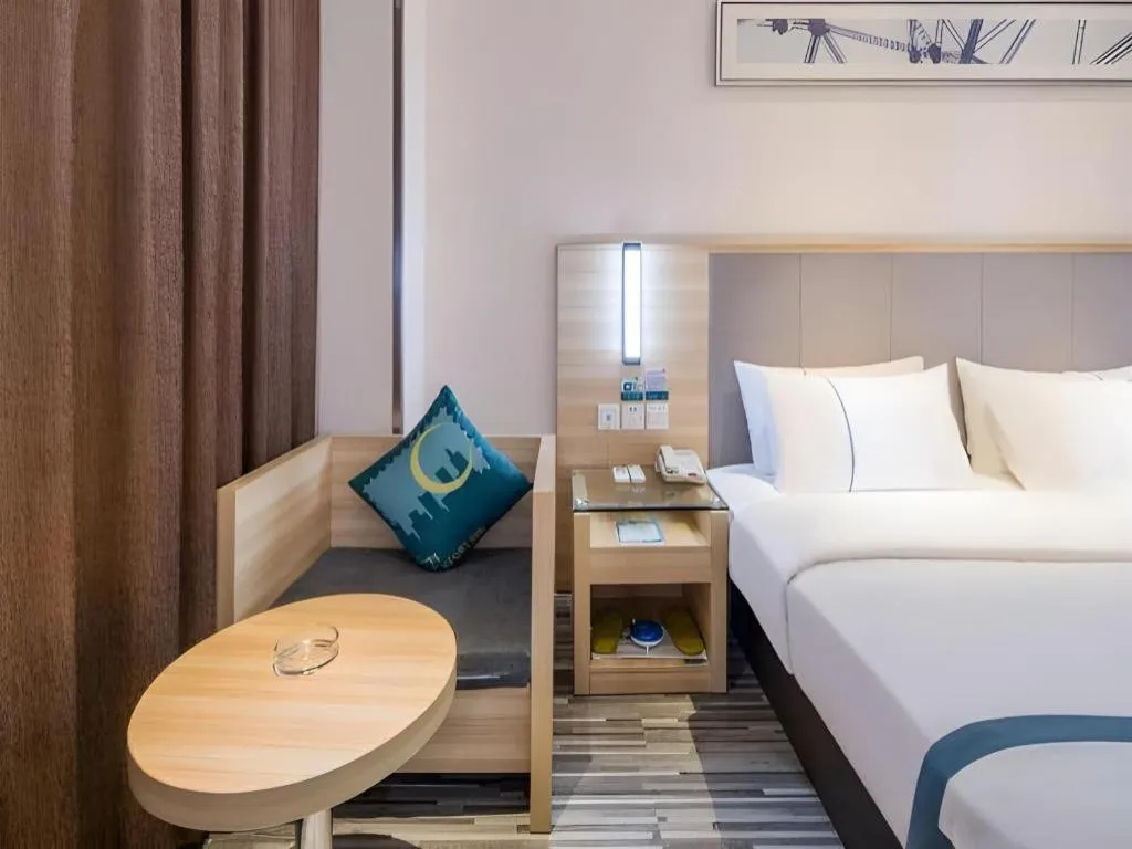 Bed in City Comfort Inn Zhongshan Xiaolan Xinduhui Gymnasium