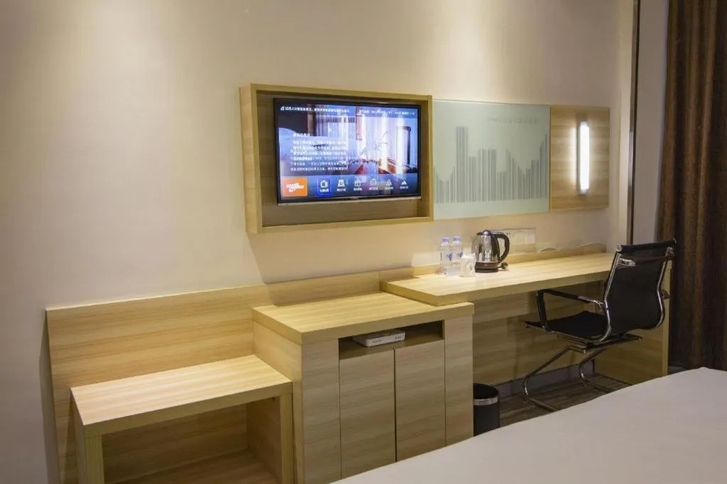 Bed in City Comfort Inn Zhongshan Xiaolan Xinduhui Gymnasium