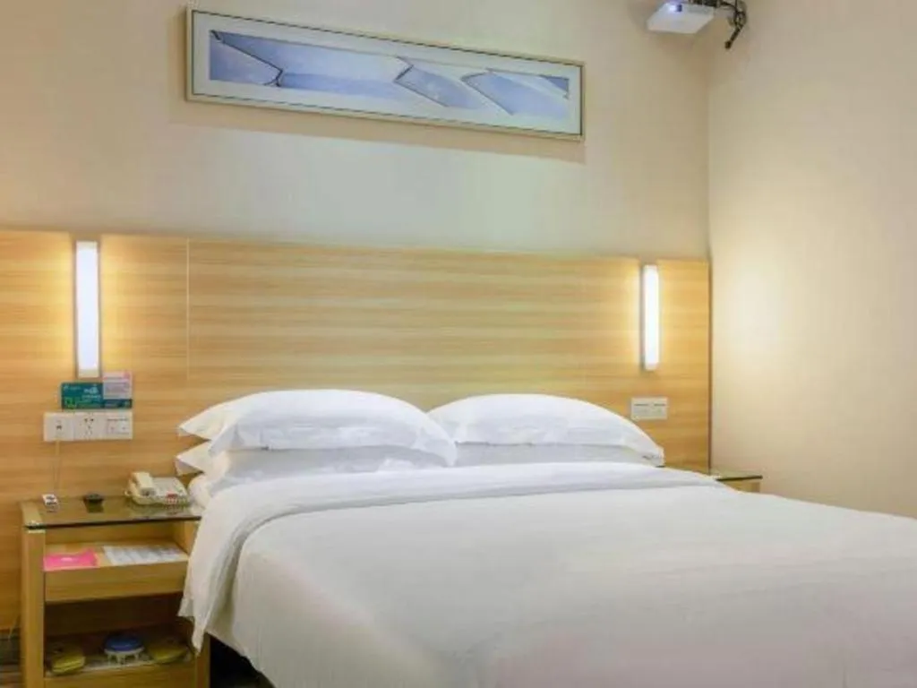 Bed in City Comfort Inn Zhongshan Xiaolan Xinduhui Gymnasium