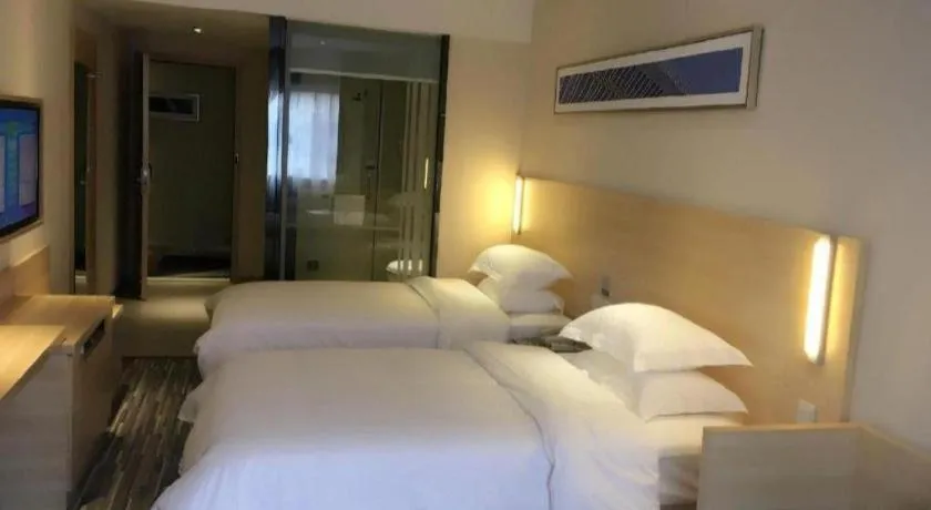 Bed in City Comfort Inn Zhongshan Xiaolan Xinduhui Gymnasium